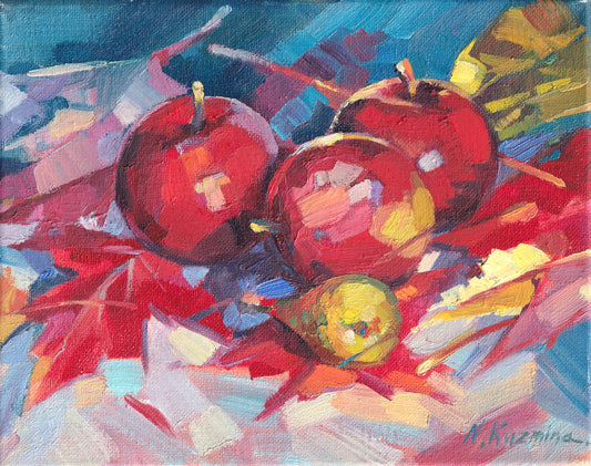 Leaves and apples at sunset